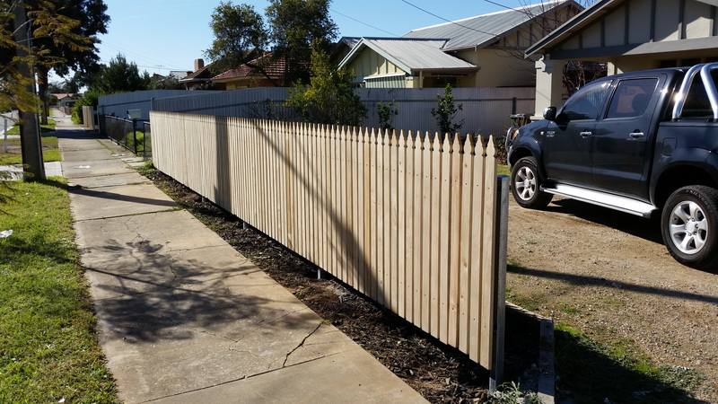 Timber picket fence